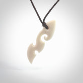 This is a wonderful, contemporary large koru from bone. Hand carved and provided with an adjustable brown cord. Order yours now on NZ Pacific at www.nzpacific.com